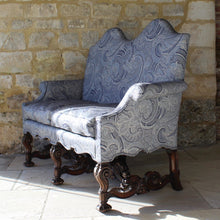 Load image into Gallery viewer, jacobean-revival-settee-exceptionally-good-quality-newly-upholstered-stunning-ludhiana-wool-fabric-intricate-decoration-inspiration-traditional-indian-patterns-features-swirling-floral-design-blue-cream-colourway-seat-completely-re-built-original-horse-hair-seat-pad-feather-cushions-settee-incredibly-stylish-comfortable-carved-parcel-gilt-show-wood-legs-stretchers-foliate-design-statement-piece-english-circa-1900-damon-blandford-antiques-stroud-gloucestershire-interior-design-seating-for-sale