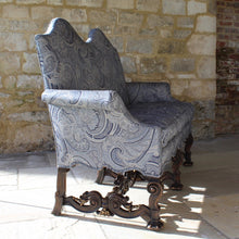Load image into Gallery viewer, jacobean-revival-settee-exceptionally-good-quality-newly-upholstered-stunning-ludhiana-wool-fabric-intricate-decoration-inspiration-traditional-indian-patterns-features-swirling-floral-design-blue-cream-colourway-seat-completely-re-built-original-horse-hair-seat-pad-feather-cushions-settee-incredibly-stylish-comfortable-carved-parcel-gilt-show-wood-legs-stretchers-foliate-design-statement-piece-english-circa-1900-damon-blandford-antiques-stroud-gloucestershire-interior-design-seating-for-sale