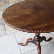 Load image into Gallery viewer, very-nice-george-III-third-mahogany-tilt-top-tripod-table-top-single-plank-mahogany-really-attractive-rim-carved-harlequin-design-repeated-tripod-legs-top-ring-turned-baluster-shape-pedestal-table-wonderful-patina-gold-red-colours-contrasting-darker-brown-black-appearance-created-really-good-decorative-highly-functional-tilt-top-table-damon-blandford-antiques-cotswolds-gloucestershire-stroud-for-sale-interior-design