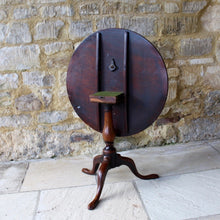 Load image into Gallery viewer, very-nice-george-III-third-mahogany-tilt-top-tripod-table-top-single-plank-mahogany-really-attractive-rim-carved-harlequin-design-repeated-tripod-legs-top-ring-turned-baluster-shape-pedestal-table-wonderful-patina-gold-red-colours-contrasting-darker-brown-black-appearance-created-really-good-decorative-highly-functional-tilt-top-table-damon-blandford-antiques-cotswolds-gloucestershire-stroud-for-sale-interior-design