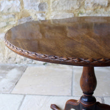 Load image into Gallery viewer, very-nice-george-III-third-mahogany-tilt-top-tripod-table-top-single-plank-mahogany-really-attractive-rim-carved-harlequin-design-repeated-tripod-legs-top-ring-turned-baluster-shape-pedestal-table-wonderful-patina-gold-red-colours-contrasting-darker-brown-black-appearance-created-really-good-decorative-highly-functional-tilt-top-table-damon-blandford-antiques-cotswolds-gloucestershire-stroud-for-sale-interior-design