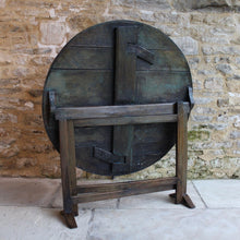 Load image into Gallery viewer, incredibly-attractive-wine-tasting-table-vendange-table-vineyards-france-french-19th-century-easily-stored-away-tilting-mechanism-top-orientated-upright-position-constructed-from-mixed-hardwoods-wonderful-time-worn-patina-historic-repairs-remnants-old-paint-occasional-table-good-condition-useful-home-damon-blandford-antiques-interior-design-chic-vintage-for-sale-cotswolds-gloucestershire-storage-country-house-antiques-garden-party-furniture-cotswolds