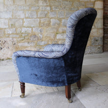 Load image into Gallery viewer, victorian-deep-button-back-upholstered-armchair-beautiful-shape-turned-legs-front-square-legs-rear-original-brass-castors-chair-professionally-re-upholstered-stunning-ludhiana-wool-fabric-intricate-decoration-inspiration-traditional-indian-patterns-swirling-floral-design-blue-cream-colourway-stylish-chair-elegant-design-english-late-victorian-damon-blandford-antiques-for-sale-the-malthouse-collective-stroud-gloucestershire-cotswolds-for-sale-antique-seating
