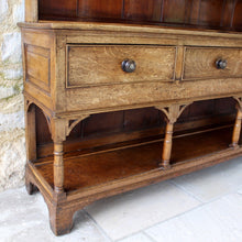 Load image into Gallery viewer, welsh-dresser-and-&-rack-fabulous-original-sun-bleached-colour-rack-moulded-cornice-above-frieze-blacksmith-forged-iron-cup-hooks-over-three-shelves-base-three-drawers-equal-length-original-turned-wooden-drawer-pulls-inlaid-mother-pearl-decoration-ring-turned-supports-carved-spandrels-pot-board-raised-bracket-feet-dresser-originates-mid-wales-newtown-powys-circa-1810-incredibly-attractive-damon-blandford-antiques-for-sale-stroud-gloucestershire