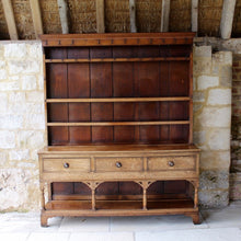 Load image into Gallery viewer, welsh-dresser-and-&-rack-fabulous-original-sun-bleached-colour-rack-moulded-cornice-above-frieze-blacksmith-forged-iron-cup-hooks-over-three-shelves-base-three-drawers-equal-length-original-turned-wooden-drawer-pulls-inlaid-mother-pearl-decoration-ring-turned-supports-carved-spandrels-pot-board-raised-bracket-feet-dresser-originates-mid-wales-newtown-powys-circa-1810-incredibly-attractive-damon-blandford-antiques-for-sale-stroud-gloucestershire