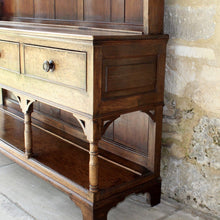 Load image into Gallery viewer, welsh-dresser-and-&-rack-fabulous-original-sun-bleached-colour-rack-moulded-cornice-above-frieze-blacksmith-forged-iron-cup-hooks-over-three-shelves-base-three-drawers-equal-length-original-turned-wooden-drawer-pulls-inlaid-mother-pearl-decoration-ring-turned-supports-carved-spandrels-pot-board-raised-bracket-feet-dresser-originates-mid-wales-newtown-powys-circa-1810-incredibly-attractive-damon-blandford-antiques-for-sale-stroud-gloucestershire