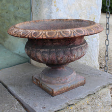 Load image into Gallery viewer, heavy-cast-iron-tazza-shaped-urn-fine-quality-fluted-body-heavy-square-pedestal-base-egg-dart-decoration-rim-wider-form-classical-shaped-urn-planter-beautifully-time-worn-finish-remnants-old-grey-red-paint-faded-pink-attractive-equally-well-suited-use-indoors-out-excellent-condition-english-circa-1860-damon-blandford-antiques-garden-decorative-home-for-sale-stroud-gloucestershire