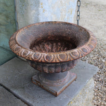 Load image into Gallery viewer, heavy-cast-iron-tazza-shaped-urn-fine-quality-fluted-body-heavy-square-pedestal-base-egg-dart-decoration-rim-wider-form-classical-shaped-urn-planter-beautifully-time-worn-finish-remnants-old-grey-red-paint-faded-pink-attractive-equally-well-suited-use-indoors-out-excellent-condition-english-circa-1860-damon-blandford-antiques-garden-decorative-home-for-sale-stroud-gloucestershire