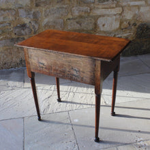 Load image into Gallery viewer, nicely-made-18th-century-provincial-oak-lowboy-three-oak-lined-drawers-cock-beading-original-brass-swan-neck-handles-pierced-back-plates-drawers-decoratively-carved-apron-a-particular-feature-of-this-tableall-raised-on-round-tapering-legs-pad-feet-excellent-colour-condition-north-england-1770-for-sale-damon-blandford-antiques-stroud-gloucestershire-country-house-furniture