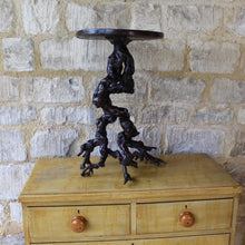 Load image into Gallery viewer, absolutely-wonderful-grapevine-root-table-late-18th-early-19th-century-gnarly-grapevine-roots-branch-out-feet-like-structures-stable-pedestal-base-supporting-circular-table-top-single-plank-hard-wood-possibly-ash-applied-lipped-edge-rose-head-nails-charming-character-excellent-condition-genuinely-unique-talking-point-patina-for-sale-damon-blandford-antiques-stroud-gloucestershire
