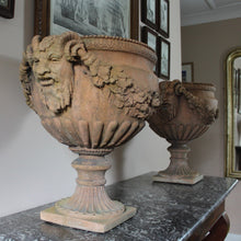 Load image into Gallery viewer, good-quality-pair-of-late-20th-century-terracotta-garden-urns-classical-reeded-cup-goblet-shape-bowl-pedestal-bases-beautifully-detailed-satyr-masks-united-fruit-foliage-swags-excellent-nicely-weathered-highly-decorative-urns-magnificent-garden-indoors-for-sale-damon-blandford-antiques-stow-on-the-wold-stroud-gloucestershire-cotswolds