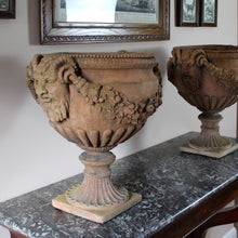 Load image into Gallery viewer, good-quality-pair-of-late-20th-century-terracotta-garden-urns-classical-reeded-cup-goblet-shape-bowl-pedestal-bases-beautifully-detailed-satyr-masks-united-fruit-foliage-swags-excellent-nicely-weathered-highly-decorative-urns-magnificent-garden-indoors-for-sale-damon-blandford-antiques-stow-on-the-wold-stroud-gloucestershire-cotswolds