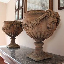 Load image into Gallery viewer, good-quality-pair-of-late-20th-century-terracotta-garden-urns-classical-reeded-cup-goblet-shape-bowl-pedestal-bases-beautifully-detailed-satyr-masks-united-fruit-foliage-swags-excellent-nicely-weathered-highly-decorative-urns-magnificent-garden-indoors-for-sale-damon-blandford-antiques-stow-on-the-wold-stroud-gloucestershire-cotswolds