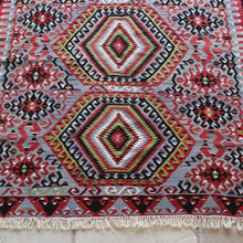 Load image into Gallery viewer, really-attractive-hand-woven-kilim-featuring-five-central-rectangular-chest-motifs-geometric-design-concentric-layers-red-green-black-white-colours-grey-ground-stylised-lozenges-central-area-field-kilim-rams-horns-symbol-power-repeated-boarder-good-quality-kilim-carpet-made-from-hand-spun-wool-yarn-natural-dyes-turkey-circa-1950s--for-sale-stroud-stow-on-the-wold-cotswolds-gloucestershire-interior-design-quality