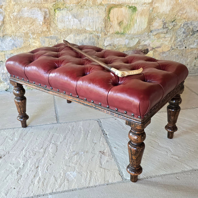 Striking-19th-century-stool-good-size-proportions-upholstered-deep-buttoned-oxblood-red-leather-turned-faux-bois-legs-simulated-rosewood-black-golden-brown-colours-eye-catching-furniture-function-well-living-room-bed-room-hall-riding-crop-whip-bdsm-for-sale-damon-blandford-antiques-stroud-cotswolds