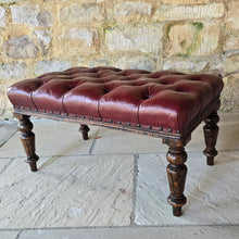 Load image into Gallery viewer, Striking-19th-century-stool-good-size-proportions-upholstered-deep-buttoned-oxblood-red-leather-turned-faux-bois-legs-simulated-rosewood-black-golden-brown-colours-eye-catching-furniture-function-well-living-room-bed-room-hall-crop-whip-bdsm-for-sale-damon-blandford-antiques-stroud-cotswolds
