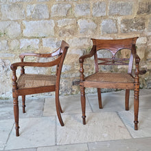 Load image into Gallery viewer, very-attractive-pair-19th-century-anglo-indian-colonial-armchairs-raffles-style-beautifully-hand-carved-teak-back-deep-shaped-crest-rails-scrolled-ends-reeded-mid-rails-down-swept-arms-baluster-shape-supports-caned-seats-fluted-legs-front-square-swept-legs-rear-attractive-comfortable-circa-1850-s-for-sale-damon-blandford-antiques-stow-on-the-wold
