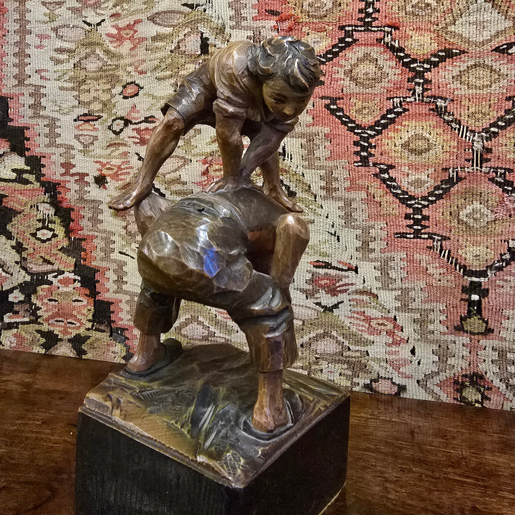 Good-19th-century-wood-carving-two boys-playing-leap-frog-single-block-linden-wood-finely-carved-folds-in-cloths-waves-in-hair-beautifully-capture-movement-wonderful-sculpture-freedom-joy-youth-european-for-sale-damon-blandford-antiques-stow-on-the-wold-cotswolds