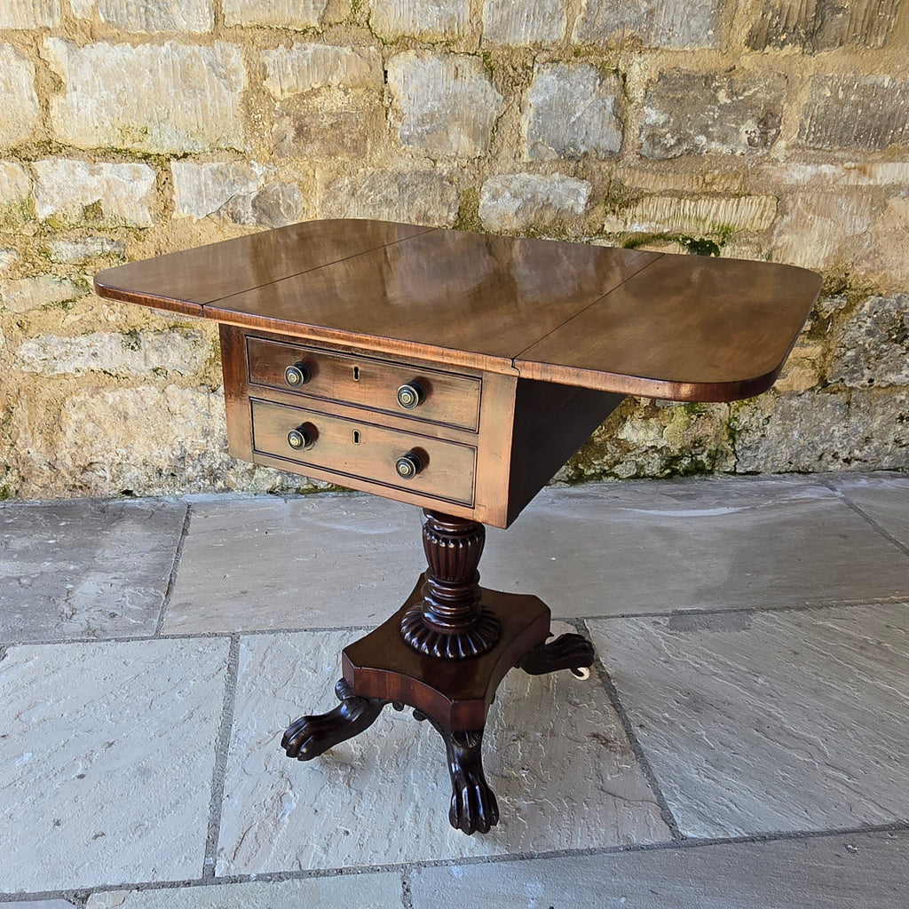 excellent-quality-table-features-cuban-mahogany-top-two-drop-leaves-two-faux-two-working-drawers-fitted-writing-slope-cock-beading-decorative-brass-knob-drawers-pulls-reeded-baluster-shape-pedestal-plinth-base-lion-paw-feet-good-condition-attractive-use-sofa-side-lamp-table-english-circa-1830-for-sale-damon-blandford-antiques-stow-on-the-wold-cotswold