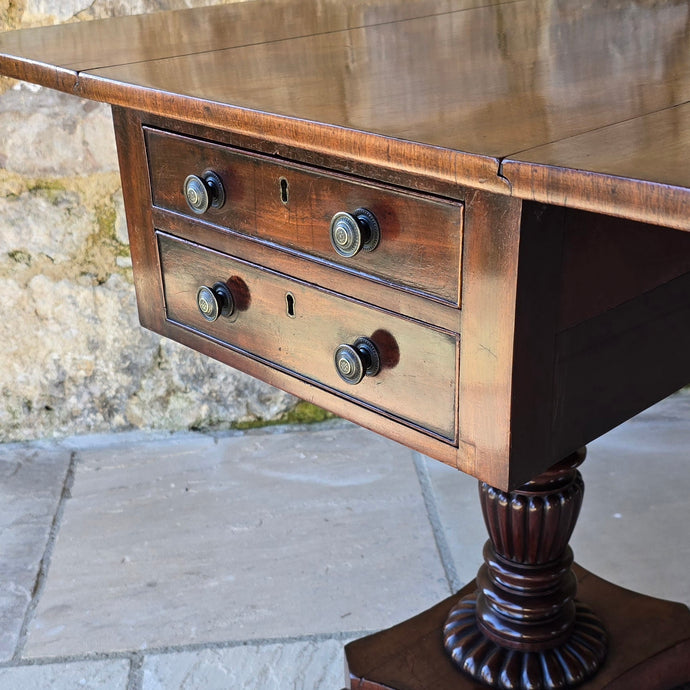 excellent-quality-table-features-cuban-mahogany-top-two-drop-leaves-two-faux-two-working-drawers-fitted-writing-slope-cock-beading-decorative-brass-knob-drawers-pulls-reeded-baluster-shape-pedestal-plinth-base-lion-paw-feet-good-condition-attractive-use-sofa-side-lamp-table-english-circa-1830-for-sale-damon-blandford-antiques-stow-on-the-wold-cotswold