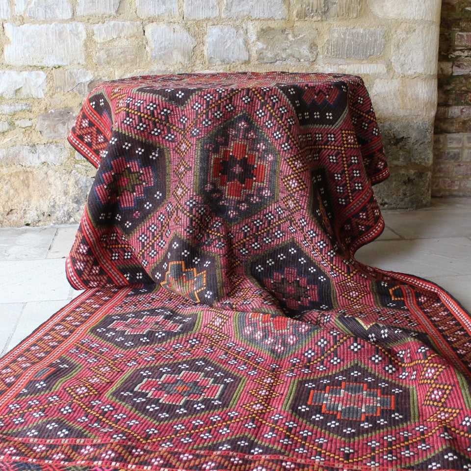 attractive-hard-wearing-floor-rug-konya-central-anatolia-rug-hand-woven-loom-goats-yarn-over-embroidered-traditional-method-cicim-hand-embroidered-geometric-design-hexagon-shape-motifs-eye-motif-central-star-outer-boarder-predominantly-pinks-browns-green-grey-orange-gold-colours-naturally-dyed-yarns-geometric-design-bold-contemporary-traditional-dining-room-kitchen-high-traffic-area-for-sale-damon-blandford-antiques-vintage-kilim-interior-design-stow-on-the-wold
