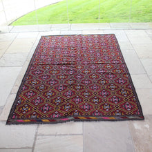 Load image into Gallery viewer, good-hard-wearing-floor-kilim-rug-konya-central-anatolia-hand-woven-goats-yarn-fibers-more-course-flat-weave-over-embroidered-traditional-method-Cicim-geometric-design-features-star-motifs-predominantly-gold-pink-grey-deep-red-golden-colour-overlapping-interconnecting-diamond-shape-border-naturally-dyed-yarns-contemporary-or-traditional-dining-room-kitchen-high-traffic-area-for-sale-damon-blandford-antiques-stow-on-the-wold-cotswolds-interiors
