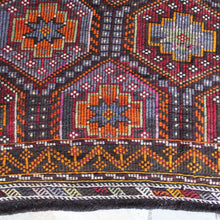 Load image into Gallery viewer, good-hard-wearing-floor-rug-konya-central-anatolia-hard-wearing-woven-from-goats yarn-fibers-more-course-flat-weave-over-embroidered-traditional-method-cicim-geometric-design-eye-star-motifs-interconnecting-hexagon-shape-boarders-predominantly-brown-orange-green-red-off-white-colours-naturally-dyed-yarns-contemporary-or-traditional-setting-dining-room-kitchen-high-traffic-area-konya-circa-1930s-for-sale-damon-blandford-antiques-vintage-stow-on-the-wold-cotswolds-interiors
