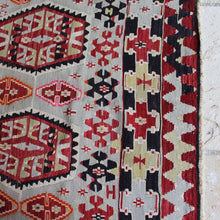 Load image into Gallery viewer, kilim-hand-woven-using-traditional-flat-weaving-techniques-esme-west-turkey-rug-features-light-grey-hand-spun-wool-yarn-rare-unusual-colour-complex-geometric-design-medallions-motifs-fetter-symbolising-continuity-of-family-union-boarder-feature-repeating-motifs-rams-horn-motifs-symbols-power-fertility-predominantly-light-grey-green-red-brown-cream-pink-colours-finely-woven-sophistication-for-sale-damon-blandford-antiques-stow-on-the-wold-cotswolds-interior-design
