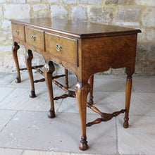 Load image into Gallery viewer, very-fine-quality-queen-anne-revival-serving-console-table-by-hamptons-pall-mall-london-beautifully-figured-pollard-oak-top-with-moulded-edge-drawers-brass-drop-handles-shaped-frieze-particularly-attractive-eight-crisply-carved-cabriole-legs-hoof-feet-united-by-turned-stretches-stylish-london-cabinet-makers-excellent-condition-wonderful-colour-console-sofa-table-tremendous-traditional-contemporary-settings-english-circa-1900-for-sale-damon-blandford-antiques-stow-on-the-wold-furniature-interior
