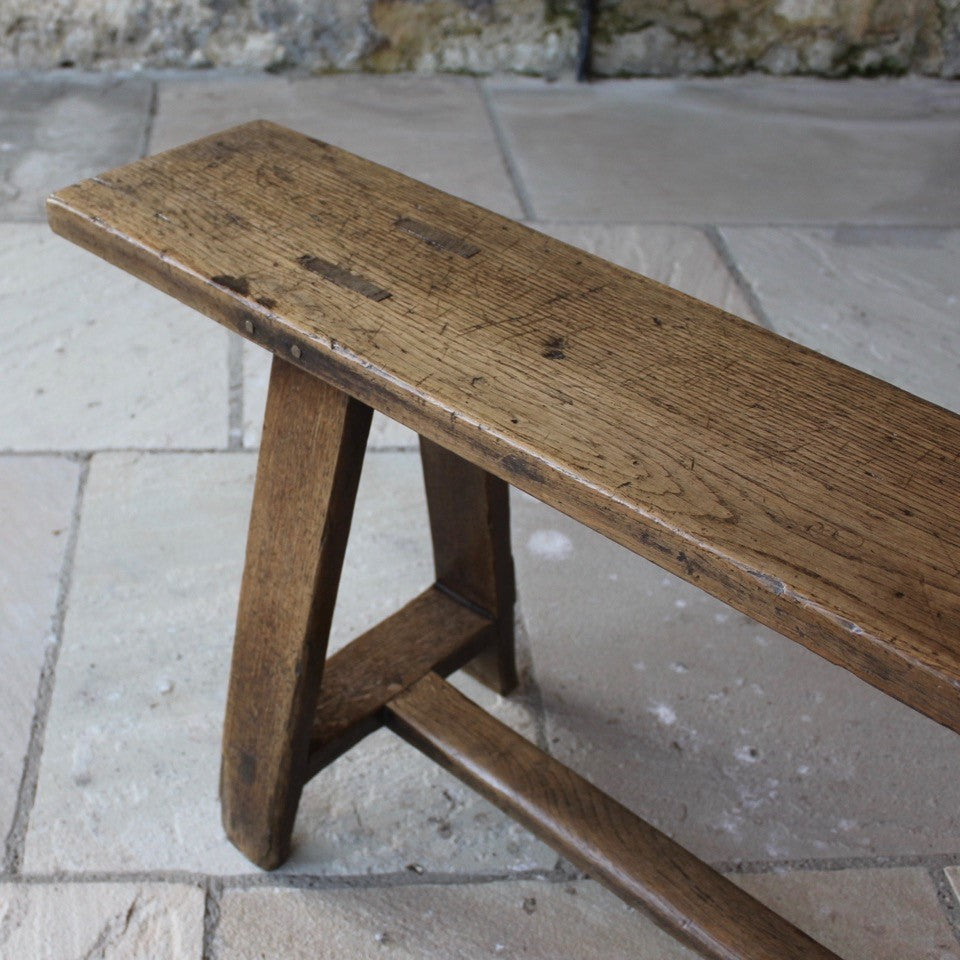 good-C18th-joined-oak-bench-splayed-legs-rectangular-form-united-by-H-shape-stretcher-pegged-mortise-tenon-joints-excellent-solid-condition-light-golden-colour-kitchen-entrance-hallway-boot-room-contemporary-period-interior-for-sale-seating-damon-blandford-antiques-stroud-stow-on-the-wold-cotswold-interior-design