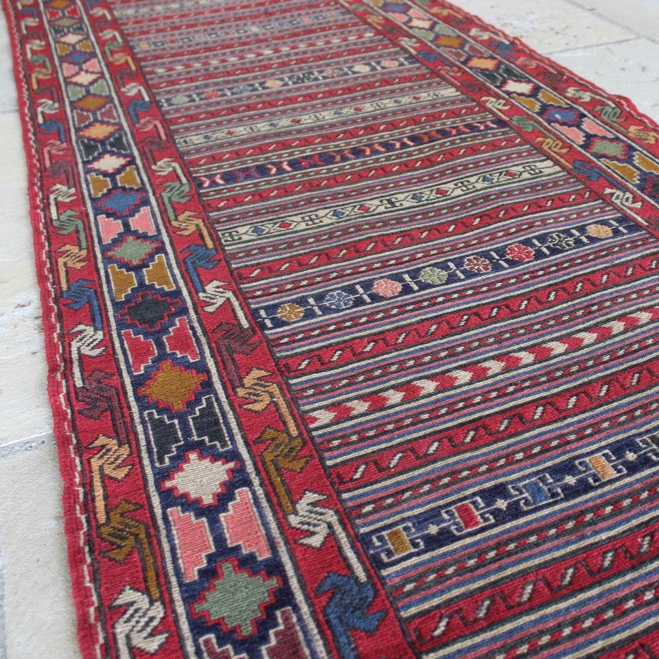 very-finely-woven-sumac-runner-hand-made-in-Iran-sumac-rugs-loom-kilims-weaving-technique-smooth-face-pair-of-kilims-sourced-together-look-feel-completely-unused-special-family-occasions-dowry-piece-wedding gifts-predominantly-red-green-pink-gold-blue-motifs-Iran-circa-1940's-1950's-for-sale-damon-blandford-antiques-phil-taylors-cool-stuff-stroud-gloucestershire-cotswolds