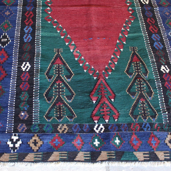 finely-woven-turkish-kilim-obruk-konya-wedding-gift-predominantly-red-green-blue-black-colours-akimbo-motifs-symbolising-motherhood-large-single-medallion-main-boarder-repeating-protective-eye-motifs-excellent-condition-floor-rug-wall-hanging-turkey -circa-1930s-40s-for-sale-damon-blandford-antiques-stroud-cotswolds-phil-taylors-cool-stuff-interior-design-rug-kilim-carpect-floor-persian
