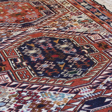 Load image into Gallery viewer, attractive-kilim-rug-hand-woven-loom-shahsevan-nomadic-people-tribe-northwestern-region-iran-design-features-three-large-central-medallions-cream-ground-surrounded-main-border-repeating-star-motifs-symbolising-happiness-fertility-stylised -bird-animal-motifs-predominantly-burnt-orange-cream-blue-colour-1960s-for-sale-damon-blandford-antiques-stroud-cotswolds-carpet-interior-floor
