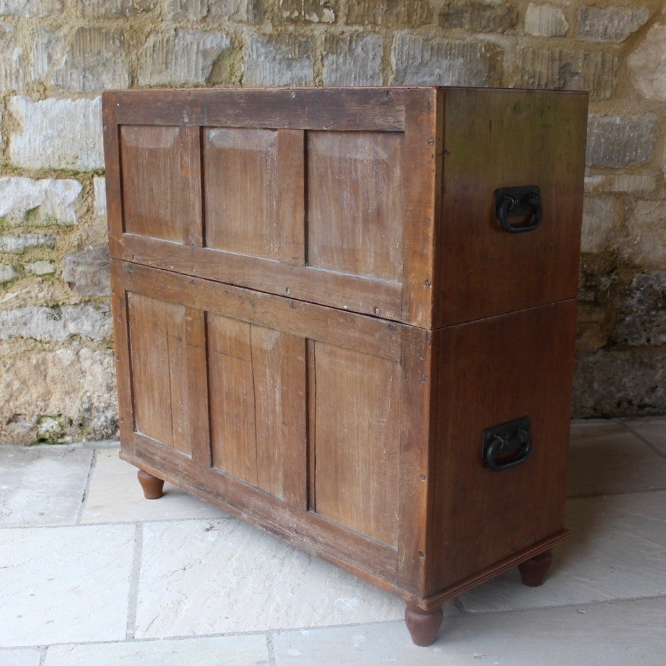 exceptionally-well-made-late-19th-century-teak-anglo-indian-chest-of-drawers-two-sections-blacksmith-forged-swing-carry-handles-upper-lower-sections-two short-three-long-drawers-brass-swan-neck-handles-molded-drawer-fronts-ebony-escutcheons-turned-feet-panel-back-quality-construction-incredibly-solid-well-made-military-campaign-travel-furniture-restricted-access-small-spaces-for-sale-damon-blandford-antiques-stow-on-the-wold-stroud-cotswolds-antiques-circa-1890