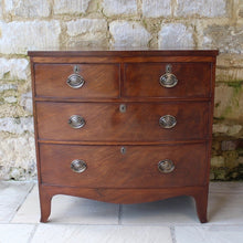 Load image into Gallery viewer, Attractive-early-19th-century-mahogany-bow-fronted-chest-of-drawers-bracket-feet-splayed at-foot-top-cross-banded-satinwood-stringing-two-short-two-long-drawers-cock-beading-drop-handles-drawers-lined-in-mahogany-fine-dovetailing-small-proportions-well-figured-veneer-particular-attractive-for-sale-damon-blandford-antiques-stroud-cotswolds-antique-storage

