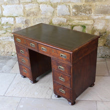 Load image into Gallery viewer, good-19th-century-anglo-chinese-campaign-desk-excellent-colour-hard-wood-teak-compact-heavier-green-leather-skiver-tooled-gilt-decoration-moulded-top-drawers-pedestals-cut-line-mould-fitted-brass-campaign-handles-paneled-back-raised-field-chinese-form-bun-feet-excellent-condition-patina-superb-incredibly-useful-compact-desk-for-sale-damon-blandford-antiques-stow-on-the-wold-cotswolds-home-office-working
