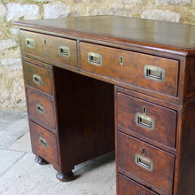 Load image into Gallery viewer, good-19th-century-anglo-chinese-campaign-desk-excellent-colour-hard-wood-teak-compact-heavier-green-leather-skiver-tooled-gilt-decoration-moulded-top-drawers-pedestals-cut-line-mould-fitted-brass-campaign-handles-paneled-back-raised-field-chinese-form-bun-feet-excellent-condition-patina-superb-incredibly-useful-compact-desk-for-sale-damon-blandford-antiques-stow-on-the-wold-cotswolds-home-office-working
