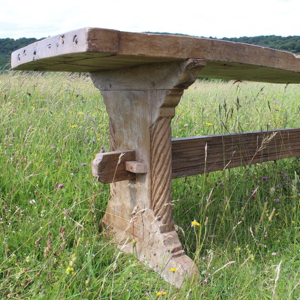 exceptionally-good-18th-century-french-refectory-table-oak-well-figured-single-plank-top-breadboard-ends-blacksmith-forged-iron-nails-trestle-style-supports-particularly-attractive-hand-carved-spiral-details-supports-united-by-deep-reeded-stretcher-wonderful-dinning-preparation-console-table-contemporary-or-period-setting-for-sale-damon-blandford-antiques-cotswolds