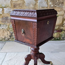 Load image into Gallery viewer, Good-quality-early-19th-century-Irish-cellarette-sarcophagus-form-pedestal-base-carved-acanthus-leaves-gadrooned-rope-twist-mouldings-brass-lion-mask-ring-carry-handles-oval-escutcheon-plate-original-lock-key-quadra-form-base-reeded-sabre-legs-hipped-carved-foliate-decoration-terminating-brass-box-toe-castors-furniture-excellent-colour-condition-patena-for-sale-damon-blandford-antiques-stow-on-the-wold-stroud-cotswolds-antique-drinks-bottles-storage
