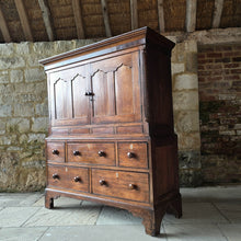 Load image into Gallery viewer, Good-well-proportioned-furniture-early19th- oak—court-cupboard-excellent-storage-top-section-canted-corners-spiral-design-flanking-ogee-panel-doors-shelf-moulded-cornice-mahogany-band-bottom-section-cock-bead-drawers-lined-pine-turned-wooden-drawer-pulls-bracket-feet-excellent-condition-good-warm-honey-colour-tones-North-West-Welsh-Borders-circa-1810-1820-for-sale-damon-blandford-antiques-stow-on-the-wold-early-oak
