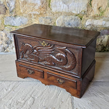Load image into Gallery viewer, -coffer-bach-welsh-country-furniture-featuring-carved-dragon-highly-decorative-18th-century-welsh-oak-coffer-bach-lid-drawer-fronts-with-moulded-ovolo-edge-storage-space-oak-lined-drawers-overlapping-ovolo-moulding-brass-drop-handles-plinth-base-excellent-condition-for-sale-damon-blandford-antiques-stow-on-the-wold-cotswolds

