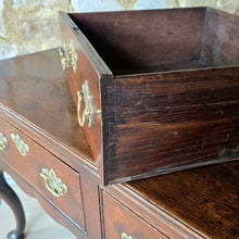 Load image into Gallery viewer, Excellent-quality-colour.mid-18th-century-oak-dresser-base-with-three-plank-top-moulded-edges-three-drawers- equal-length-plain-edges-brass-handles-escutcheons-fretwork-design-shapes-freeze-shapely-cabriole-legs-excellent-condition-for-sale-damon-blandford-antiques-cotswolds 
