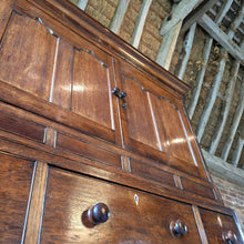 Load image into Gallery viewer, Good-well-proportioned-furniture-early19th- oak—court-cupboard-excellent-storage-top-section-canted-corners-spiral-design-flanking-ogee-panel-doors-shelf-moulded-cornice-mahogany-band-bottom-section-cock-bead-drawers-lined-pine-turned-wooden-drawer-pulls-bracket-feet-excellent-condition-good-warm-honey-colour-tones-North-West-Welsh-Borders-circa-1810-1820-for-sale-damon-blandford-antiques-stow-on-the-wold-early-oak
