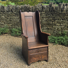 Load image into Gallery viewer, good-example-vernacular-lambing-chair-painted-pine-boarded-paneled-back-shaped-crest-rail-side-wings-generous-shaped-arm-supports-boarded-seat-drawer-under-seat-storage-shepherds-lambing-raked-back-rests-comfortable-side-wings-lancashire-circa-1800-late-C18th-earlyC19th-century-for-sale-damon-blandford-antiques-stow-on-the-wold-cotswolds
