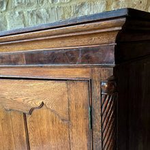 Load image into Gallery viewer, Good-well-proportioned-furniture-early19th- oak—court-cupboard-excellent-storage-top-section-canted-corners-spiral-design-flanking-ogee-panel-doors-shelf-moulded-cornice-mahogany-band-bottom-section-cock-bead-drawers-lined-pine-turned-wooden-drawer-pulls-bracket-feet-excellent-condition-good-warm-honey-colour-tones-North-West-Welsh-Borders-circa-1810-1820-for-sale-damon-blandford-antiques-stow-on-the-wold-early-oak
