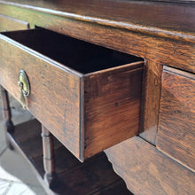 Load image into Gallery viewer, good-colour-georgian-welsh-oak-dresser-with-rack-constructed-from-well-figured-timbers-dresser-comprises-three-drawers-above-cupids-bow-shap- frieze-turned-supports-pot-board-excellent-condition-fresh-to-market-attractive-useful-furniture-south-wales-circa-1790-1810-good-original-condition-for-sale-damon-blandford-antiques-stow-on-the-wold
