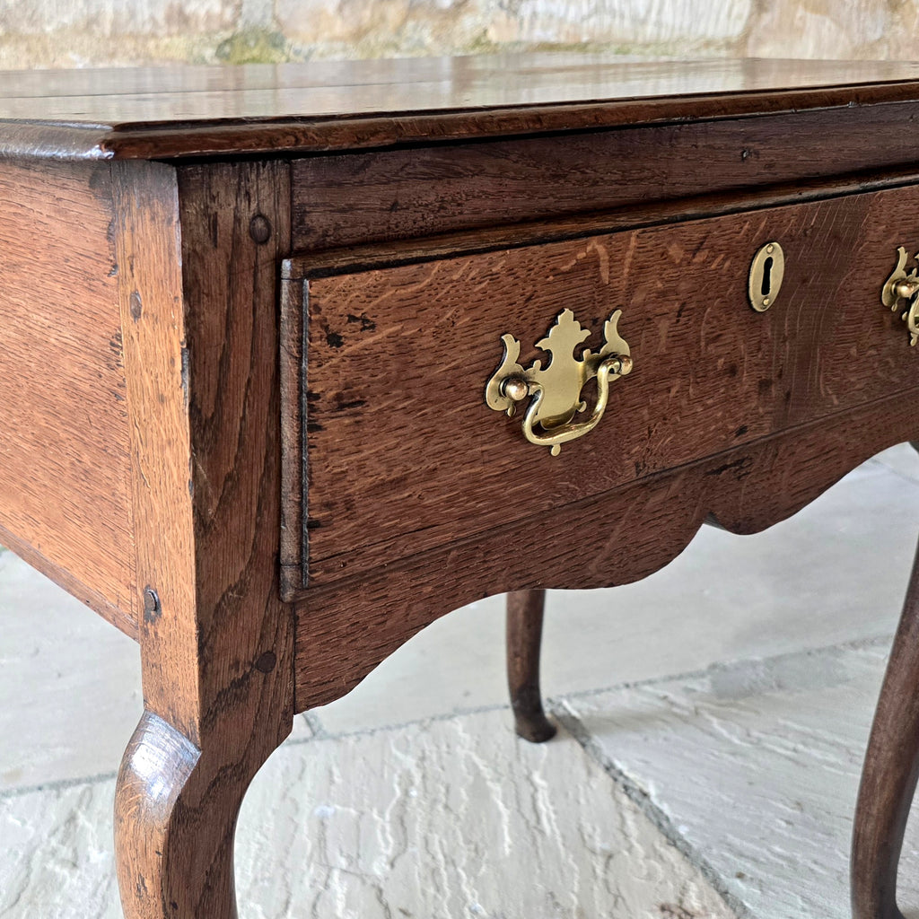 wonderful-shape-early-Georgian-oak-low-boy-top-with-moulded-edge-full-width-drawer-overlapping-ovolo-moulding-shaped-frieze-slim-tapered-cabriole-legs-elegant-useful-side-lamp-table-good-condition-provenance-vernacular-early-oak-country-for-sale-damon-blandford-antiques-stow-on-the-wold-gloucestershire