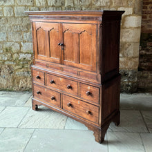 Load image into Gallery viewer, Good-well-proportioned-furniture-early19th- oak—court-cupboard-excellent-storage-top-section-canted-corners-spiral-design-flanking-ogee-panel-doors-shelf-moulded-cornice-mahogany-band-bottom-section-cock-bead-drawers-lined-pine-turned-wooden-drawer-pulls-bracket-feet-excellent-condition-good-warm-honey-colour-tones-North-West-Welsh-Borders-circa-1810-1820-for-sale-damon-blandford-antiques-stow-on-the-wold-early-oak
