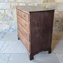 Load image into Gallery viewer, good-late-18th-century-oak-chest-of-drawers-constructed-from-well-figured-timbers-two-short-three-long-graduated-drawers-ovolo-moulding-original-brass-drop-handles-bracket-feet-good-colour-excellent-restored-condition-for-sale-damon-blandford-antiques-stroud-cotswolds-antique-furniture-storage

