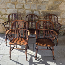 Load image into Gallery viewer, five-well-matched-windsor-armchairs-ash-splat-hoop-stick-back-central-shaped-splat-pierced-decoration-arm-bow-turned-supports-saddled-seat-turned-legs-H-shape-stretcher-very-comfortable-excellent-solid-condition-function-well-as-informal-dining-chairs-for-sale-damon-blandford-antiques-stow-on-the-wold-stroud-cotswolds-antique-seating
